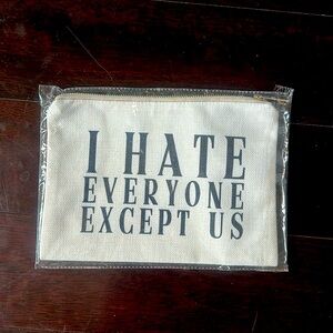 NWT zip up jute like pouch